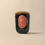 Celeste Naturals Santal Rouge Candle in a dark amber jar with Cork Lid