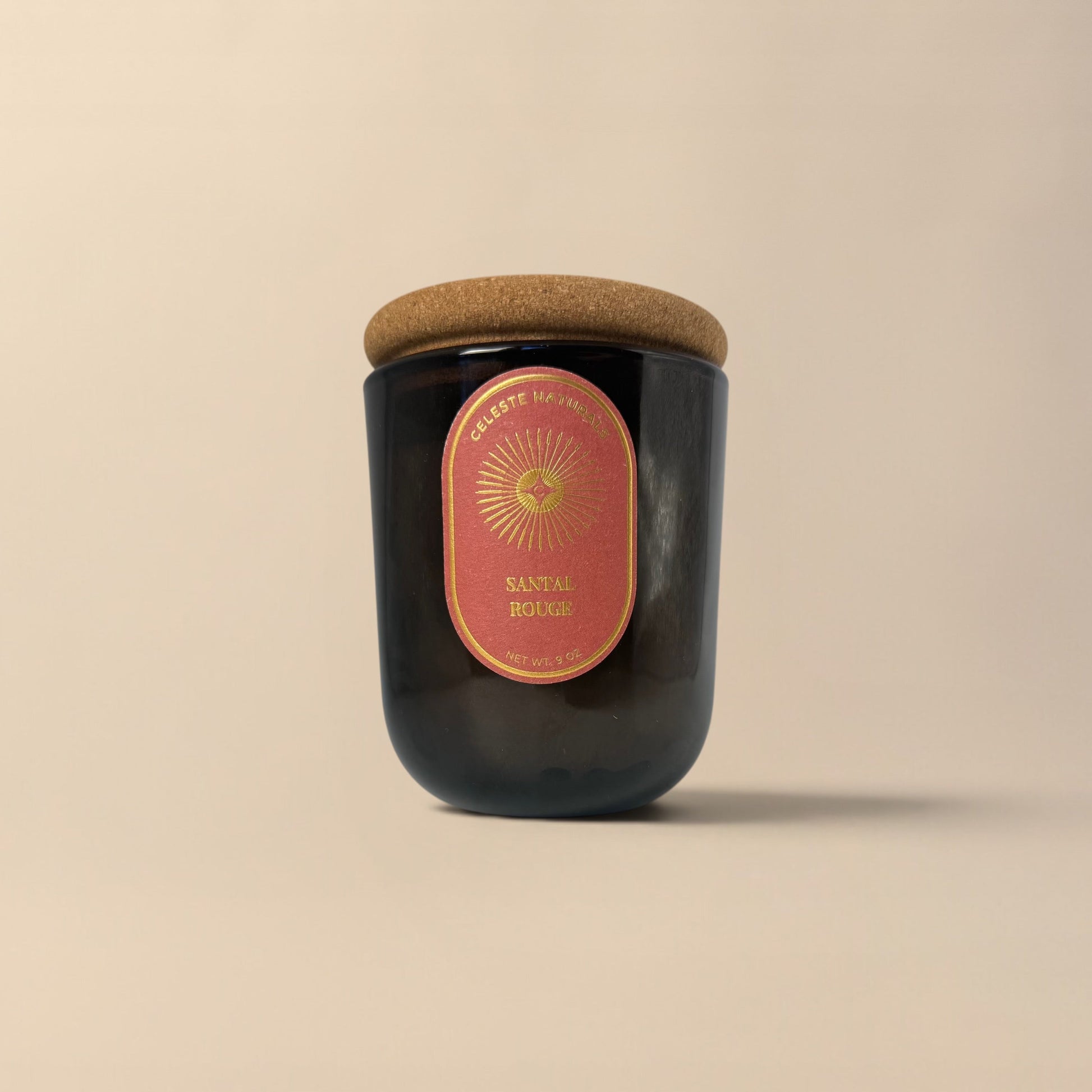 Celeste Naturals Santal Rouge Candle in a dark amber jar with Cork Lid
