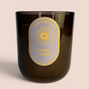 Celeste Naturals Seaside Escape candle on a beige background