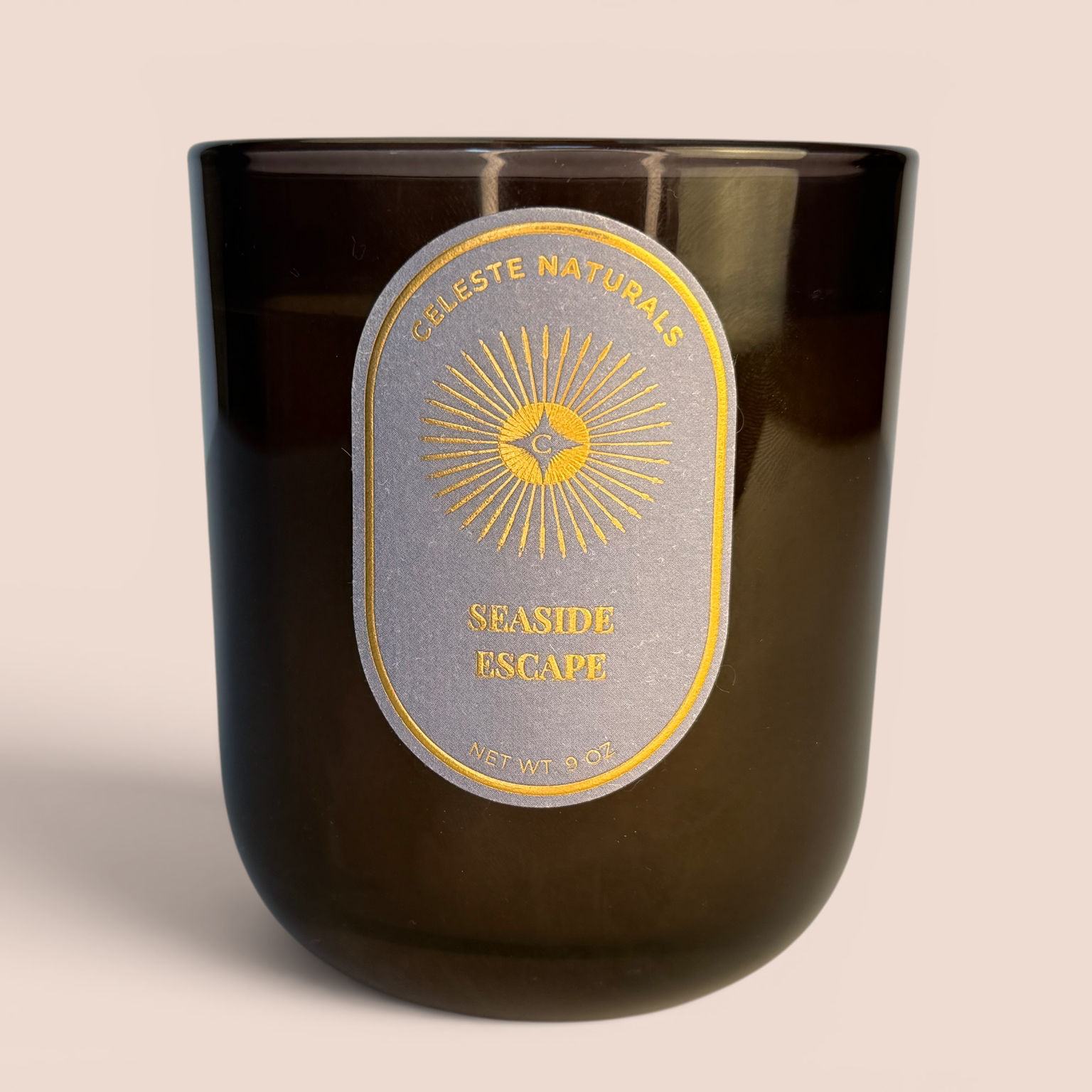 Celeste Naturals Seaside Escape candle on a beige background
