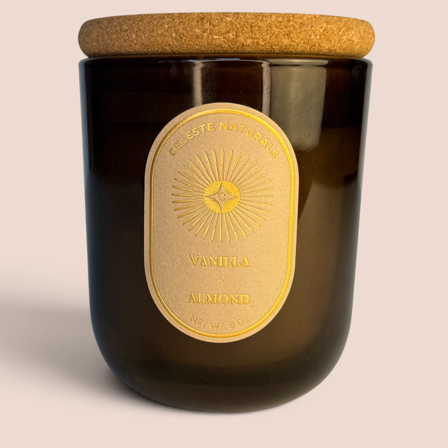 Celeste Naturals Vanilla + Almond candle with cork lid on a beige background