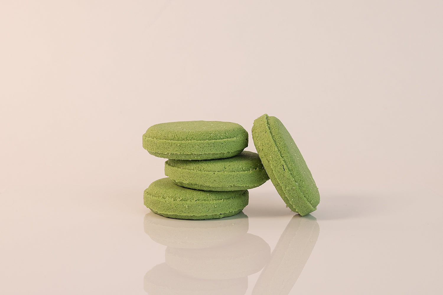 Group of CELESTE NATURALS EUCALYPTUS + MINT SHOWER STEAMERS on a beige background