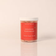 Jar of CELESTE NATURALS SANTAL ROUGE Sugar Scrub on a beige background