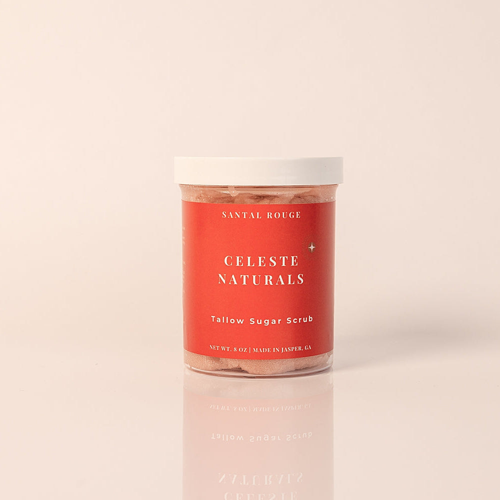 Jar of CELESTE NATURALS SANTAL ROUGE Sugar Scrub on a beige background