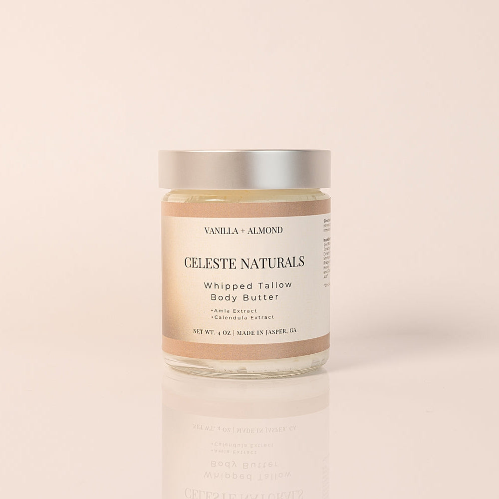 CELESTE NATURALS VANILLA + ALMOND body butter jar on a beige background